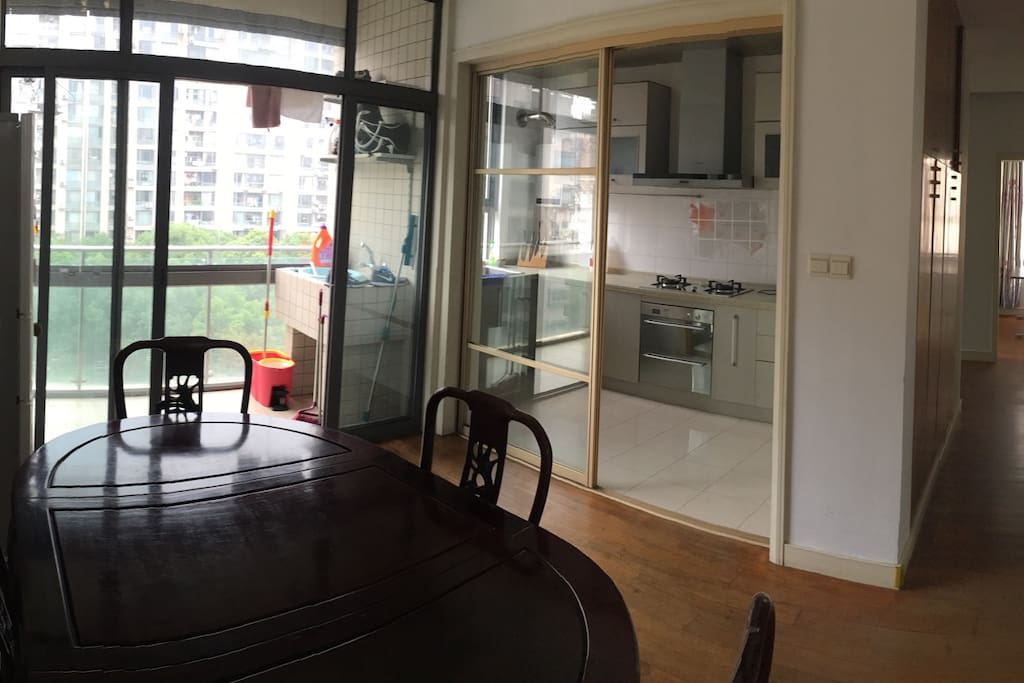 Kitchen, dining area, second balcony.