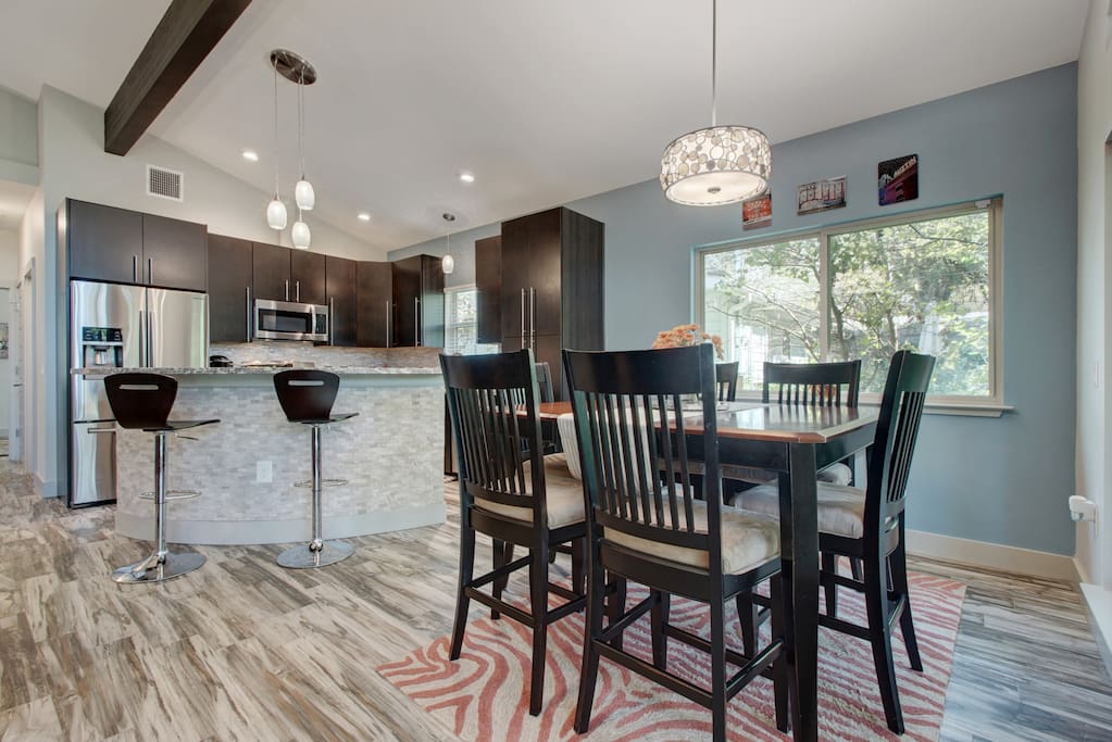This dining area sits atop striking tile floors that resemble petrified wood.