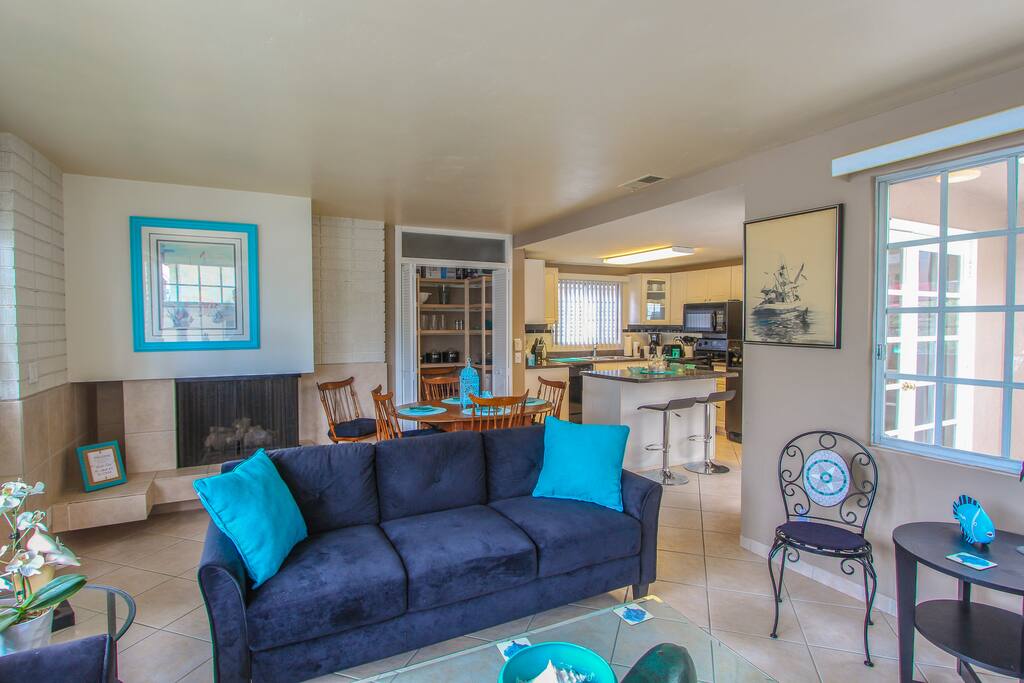 Welcome to this classy coastal retreat with beachy touches in the living room.