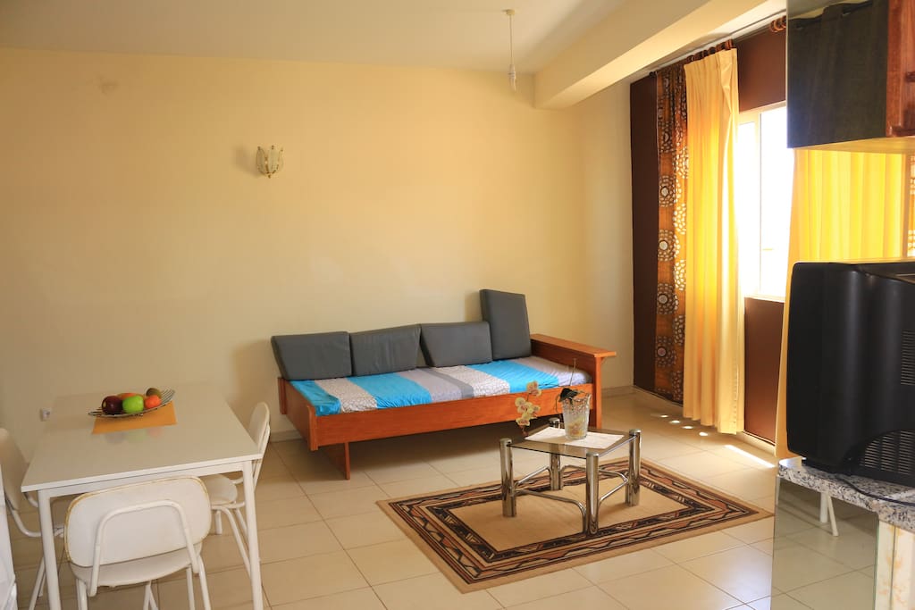 Living room with bed (sofa)