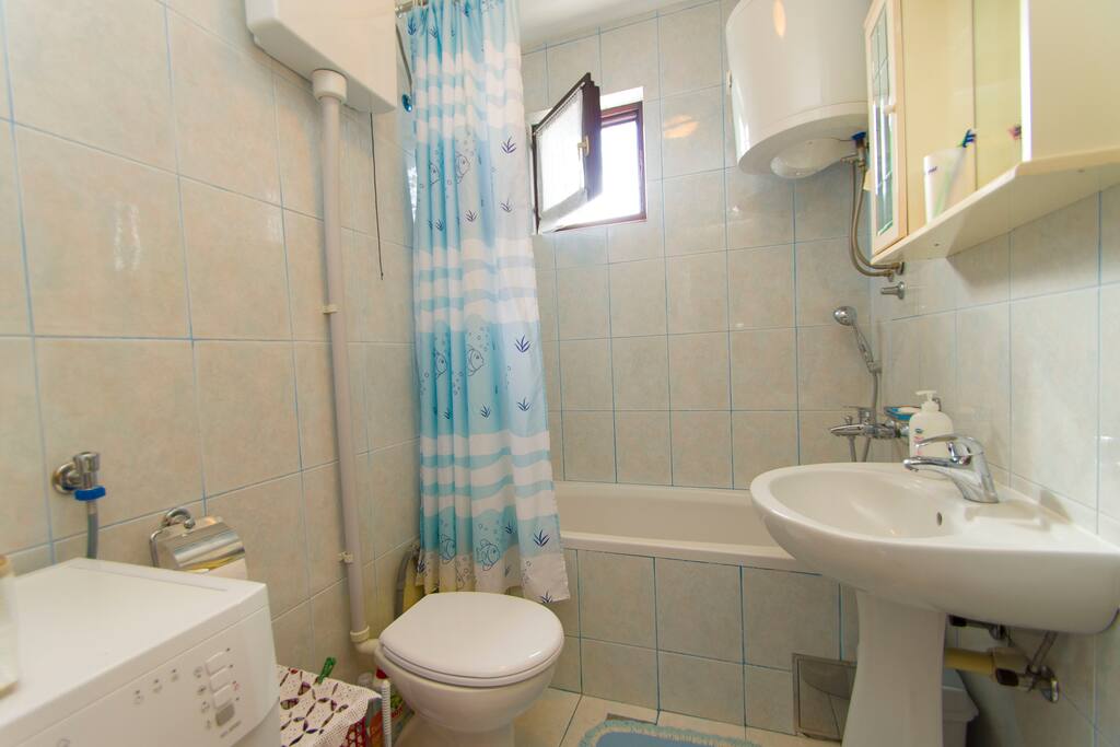 Bathroom which you will share with my mother and me.