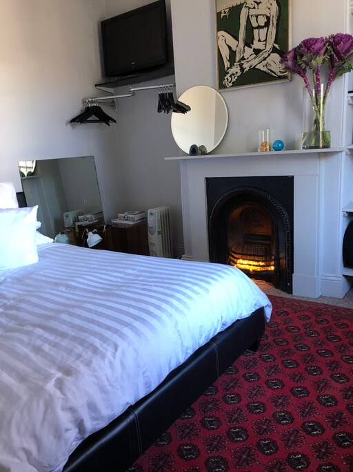 NOT a working fireplace. Clearly pictured to the left is an oil heater that will keep your room VERY warm. Please note that the multi plug WILL overload if you use hairdryer, heater, straightening irons and curling wand at the same time. You can SIMPLY reset by pushing the black button on the side after you remove a plugs.