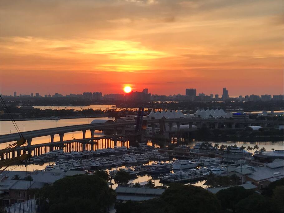 The sunrise looking east from a large wrap-around balcony.
