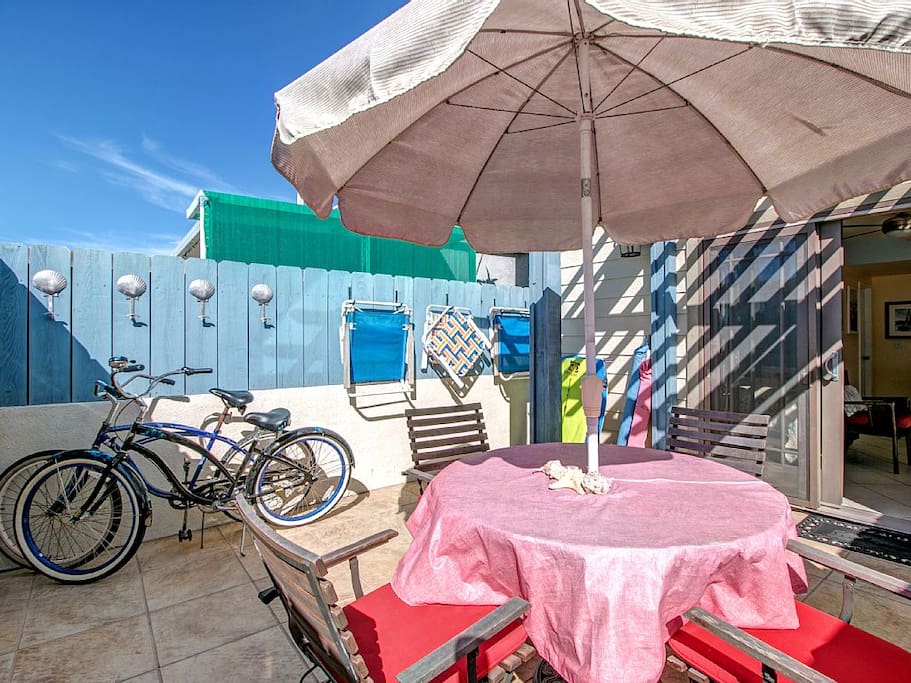Private gated patio, great place to enjoy a meal, store the included new bikes, or a safe outdoor area for your furry travel companions.