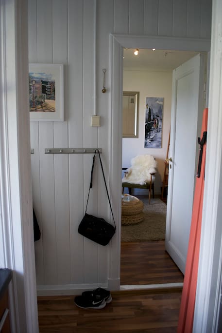 Hallway and living room, seen from kitchen.