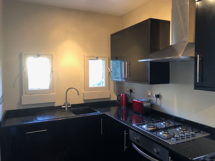 Fully Fitted Kitchen with Granite worktops, dishwasher, washing machine, tumble dryer, fridge freezer.