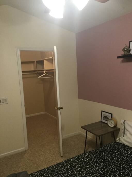 extra large walk in closet for storage. better for longer term guests