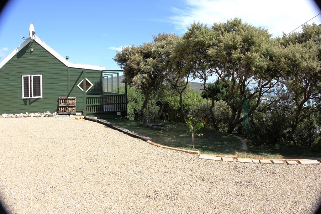 Timber home with plenty of parking and a shady lawn for relaxing.
