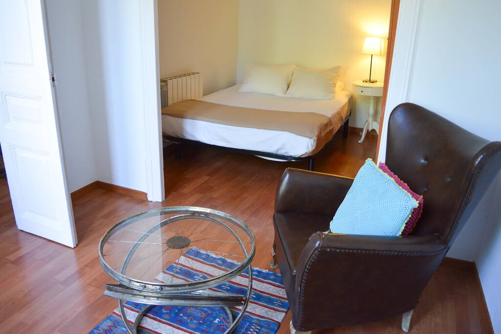 Large double bedroom with private space and balcony