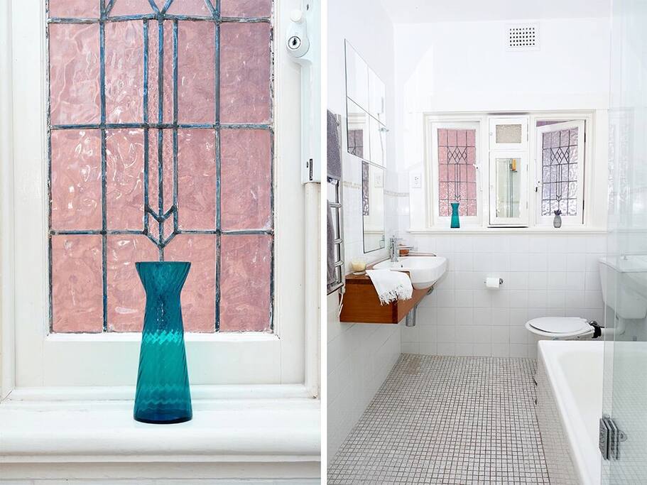 The bathroom shared between the two rooms.