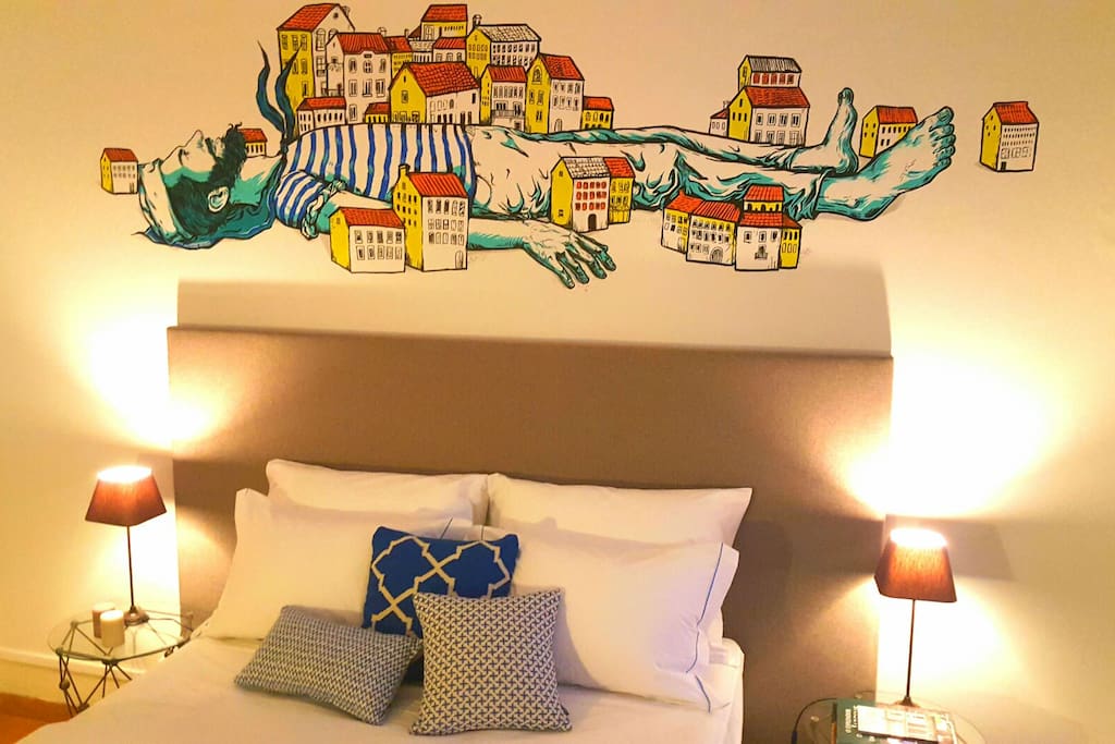 We ask a well-known young artist to create a piece of artwork on the wall ... so is born "the lying sailor" by Nicolae Segura