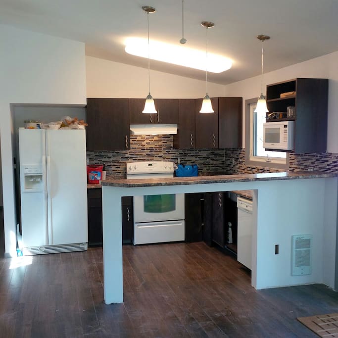 There are 4 bar stools for the breakfast bar