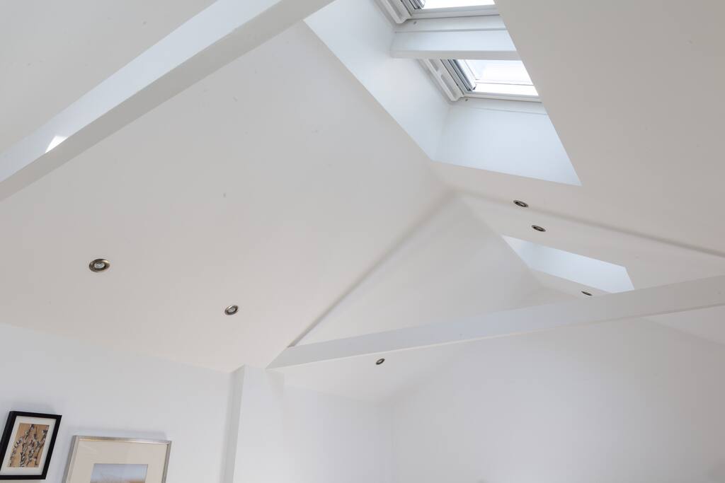 Remote-controlled VELUX roof windows that illuminate more natural light and fresh air for your indoor comfort.