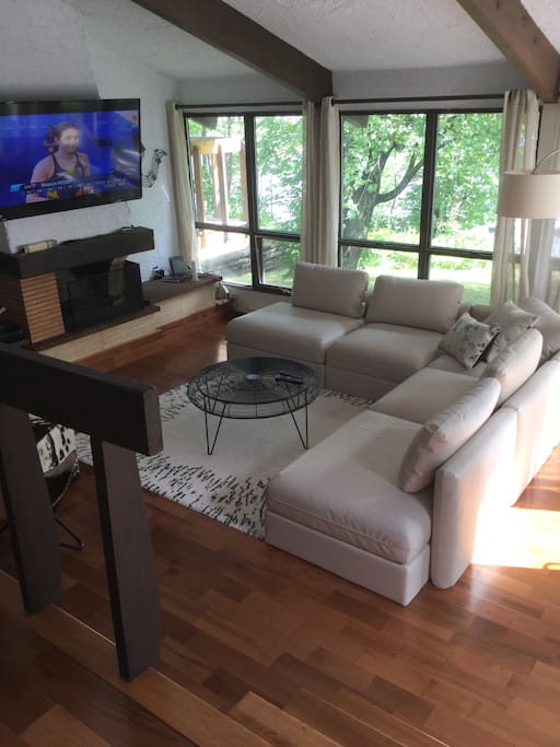The living room filled with natural sunlight.