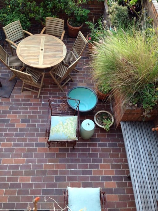 Private outdoor courtyard with seating for 6