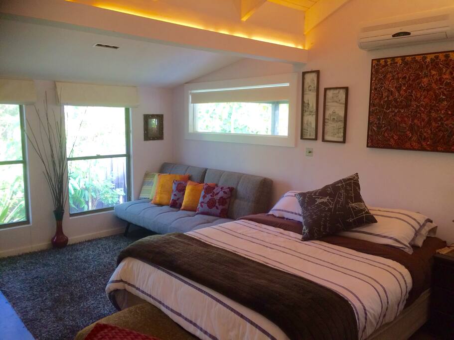 Your Queen size bed with sofa in background