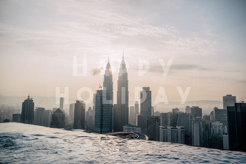 HIGHLIGHT: Sunrise view of KLCC Twin Towers from the infinity sky pool on the Sky Deck