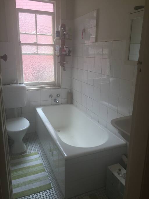 Large bath tub that fits 2 people :) and over head shower