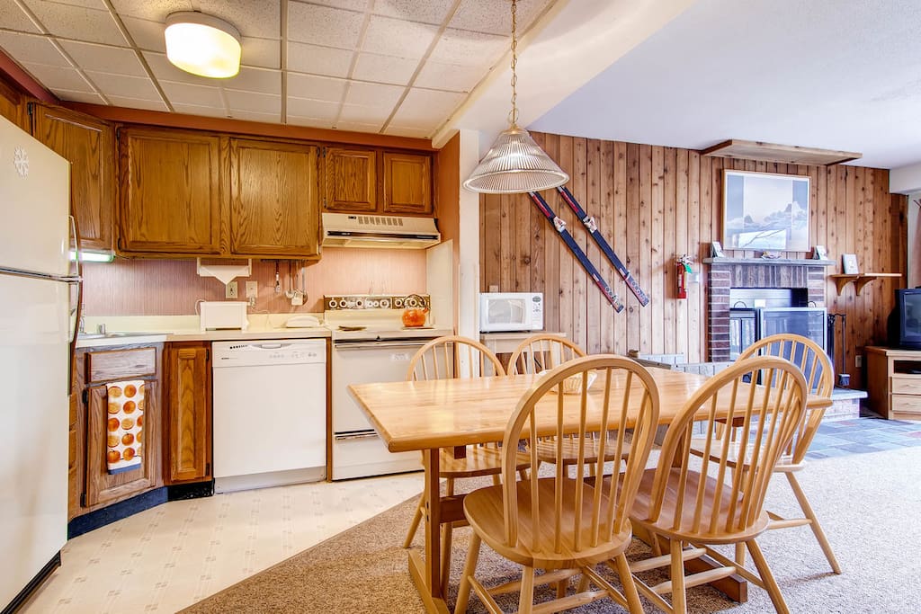 The dining table and kitchen