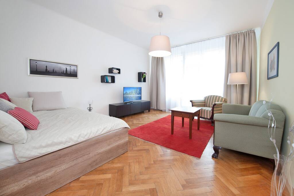 Lovely bright bedroom with a balcony.