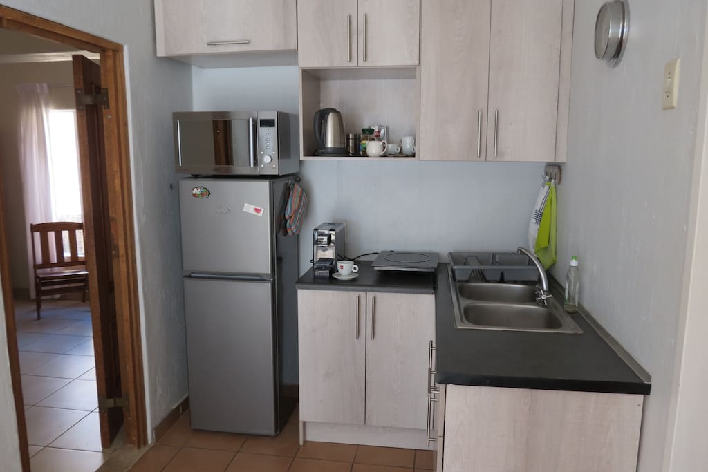 Kitchenette, with convection/microwave combination and a convection plate for cooking.