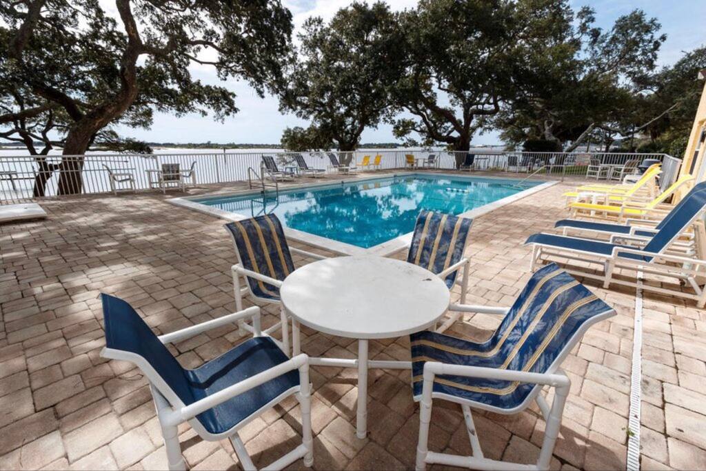 Relax by the Pool overlooking the water