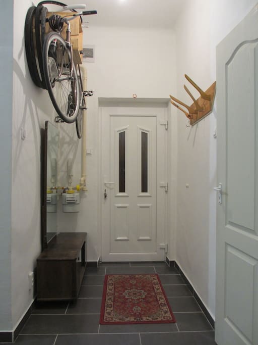 The short entrance corridor. Careful with bike above when you remove or put your shoes on!