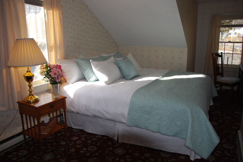 Room 7 has a king size bed with a west facing window for views of sunsets and the west expansive lawn