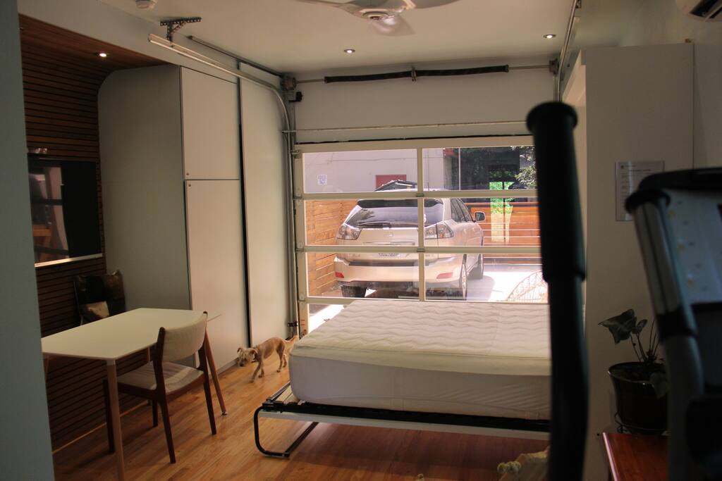 In this photo you can see the glass garage door. Unit is completely separate from the main house. When you are renting, the only entrance is via the back door.