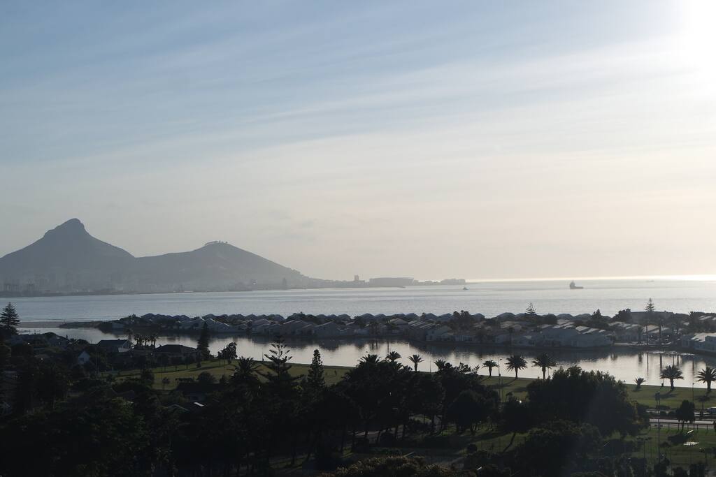 View from the apartment over the lagoon and across the bay with Lion's Head and Signal Hill.