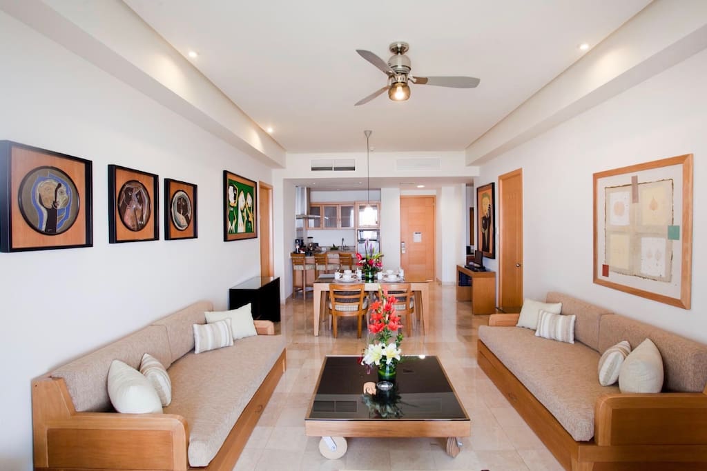 This space features two bedrooms with two king-size beds, two bathrooms, one Jacuzzi tub, and a living room with dining table and kitchen. It also features a terrace with private plunge pool and three TVs.