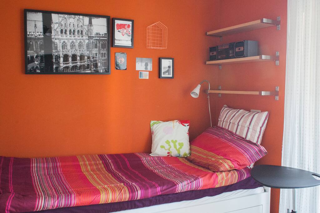 The bed with table side and shelfs