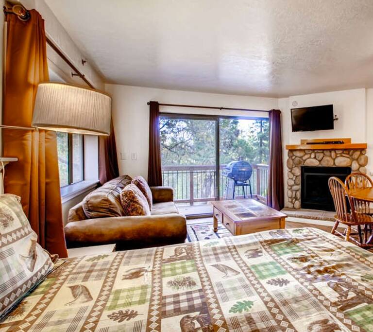 Studio Condo B112, has a queen size bed, a sofa bed, a table for 4, Fireplace, TV/DVD, Satellite, Kitchenette, balcony with gas grill. Nice meadow View!