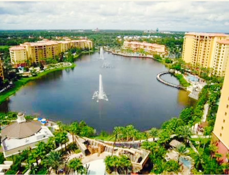 This beautiful resort offers two lazy rivers, two waterslides, several pools, many hot tubs, mini golf, a park, activities, stores, family bars, restaurants, arcades, work out centers, business centers, and more. It is located only minutes away from Disney World.