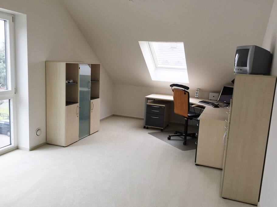 Desk in the other half of the sleeping room.