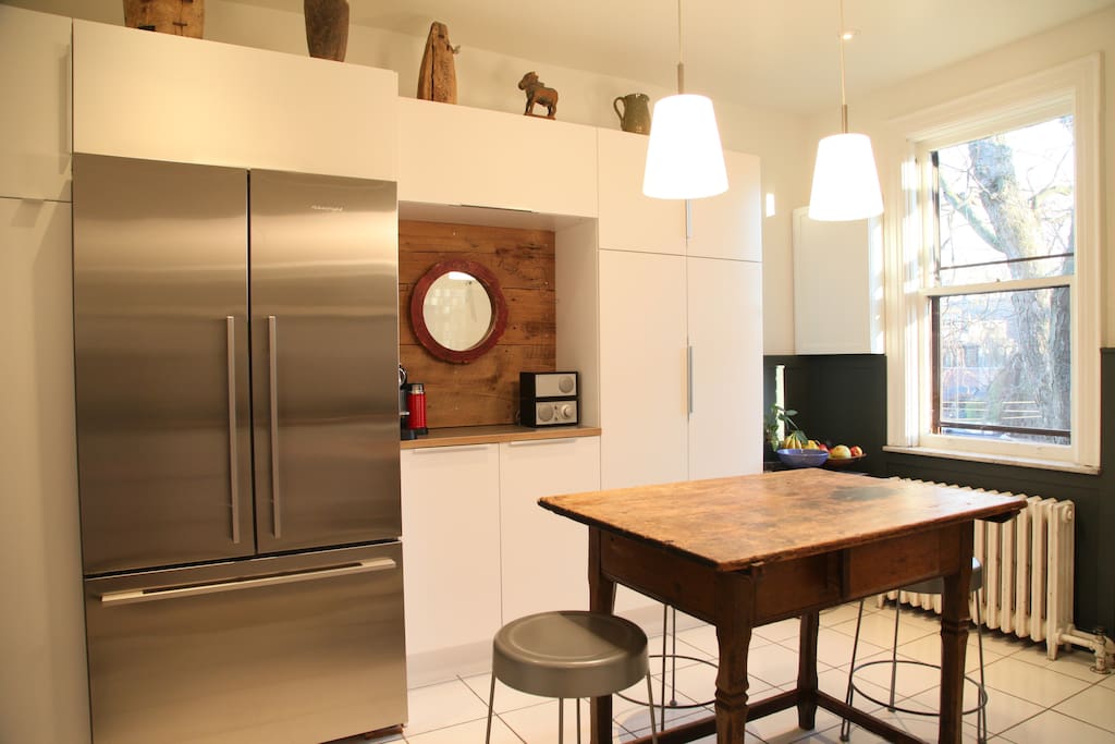 Spacious fridge, Nespresso machine & Tivoli radio in the kitchen
