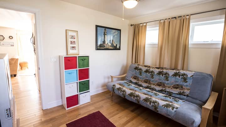 Downstairs Playroom/Bedroom. The couch here is actually a futon that can open up into a queen size mattress!