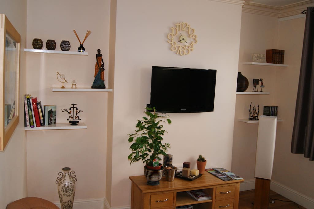 Living Room. TV has freeview and there is a range of novels and guide books for you to read.