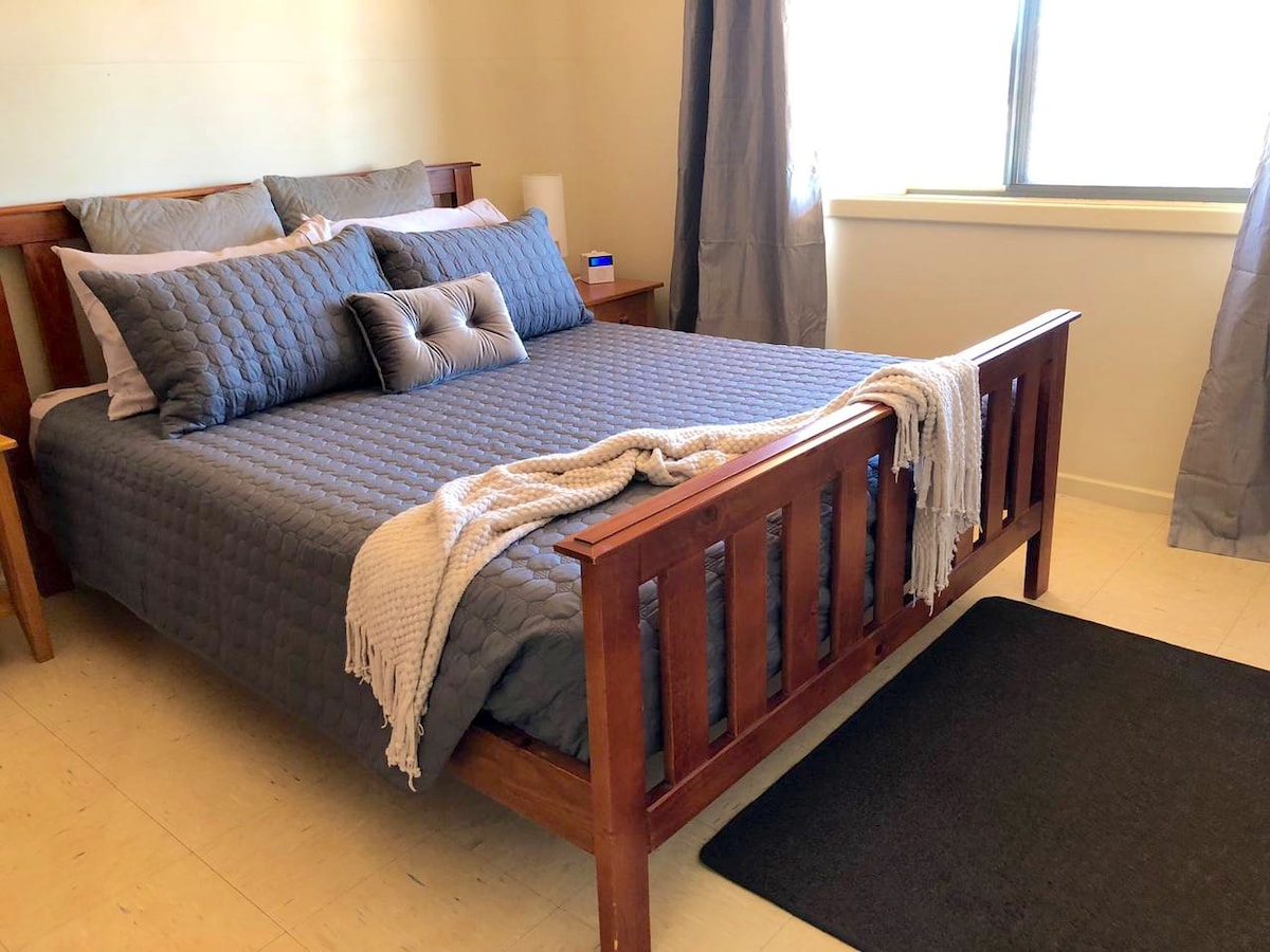 Master bedroom with comfortable queen size bed and quality linen. 