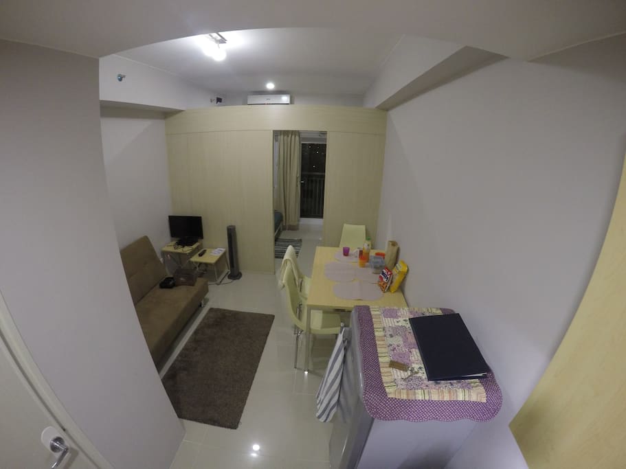 carpet + dining set + sofabed + tv/dvd playe + fridge