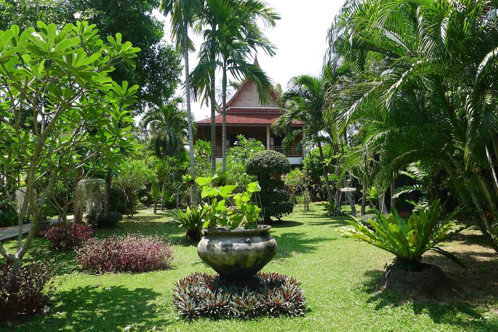 Thai house in tropical garden
