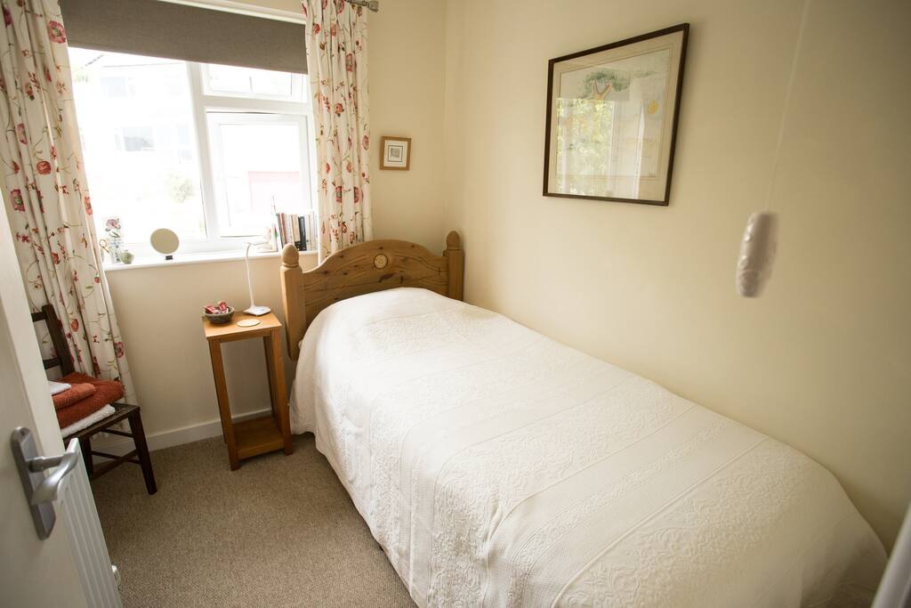 comfortable bed with cupboards to hang clothes