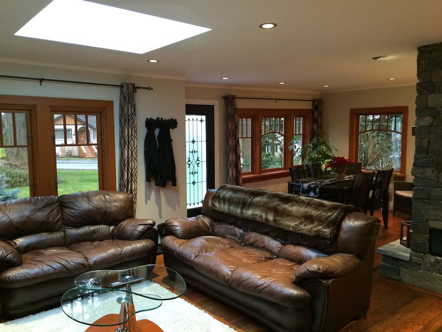 Bright, open living space with replica 1937 fir windows.