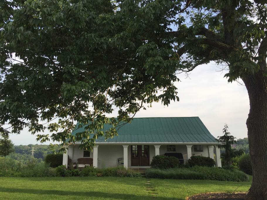 This is the front of the cottage with the wrap around porch