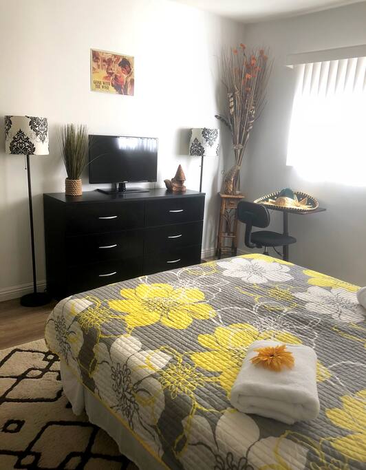 The room includes a 32in TV with Chromecast, a coffee maker (coffee in the kitchen, ask me about it), tea, and a mini fridge.