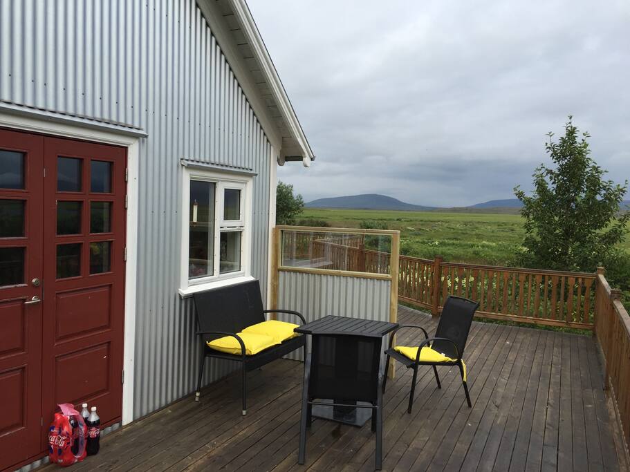 Enjoy your morning coffee or just relax right outside the kitchen