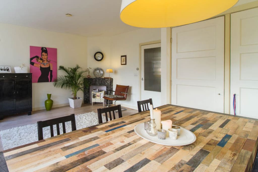 Nice dinnertable in the livingroom to have a meal or where you can work on your laptop