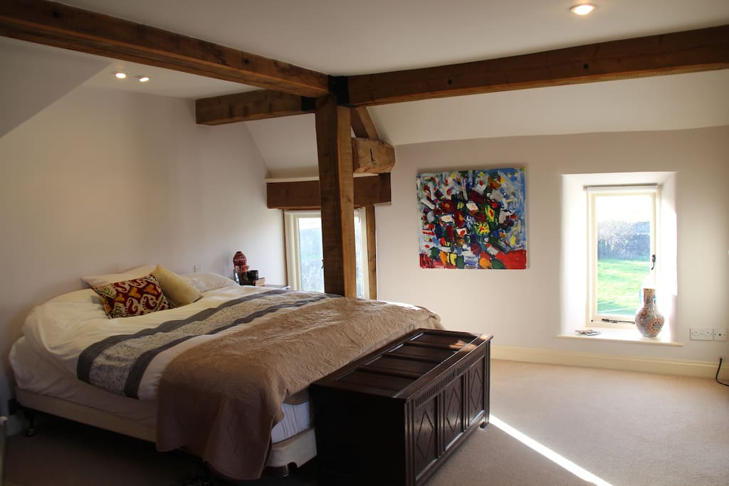 Master bed with beams and very comfy king bed (6ft)