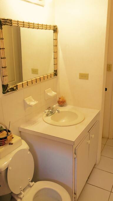 Private Bathroom with tub and shower.