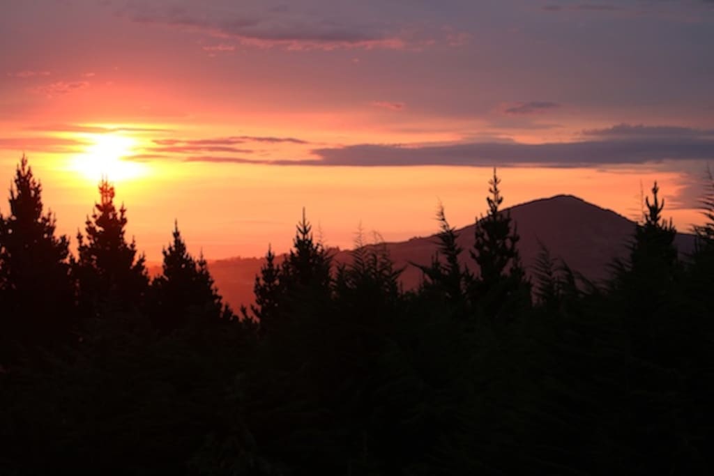 Sunset across the valley in the evening